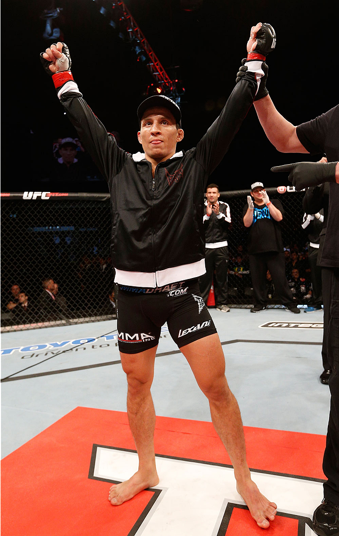 BELO HORIZONTE, BRAZIL - SEPTEMBER 04: Joseph Benavidez reacts after his knockout victory over Jussier Formiga in the flyweight fight during the UFC on FOX Sports 1 event at Mineirinho Arena on September 4, 2013 in Belo Horizonte, Brazil. (Photo by Josh