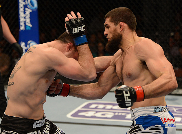 ANAHEIM, CA - FEBRUARY 23: (R-L) Court McGee punches Josh Neer in their welterweight bout during UFC 157 at Honda Center on February 23, 2013 in Anaheim, California. (Photo by Donald Miralle/Zuffa LLC/Zuffa LLC via Getty Images) *** Local Caption *** Co
