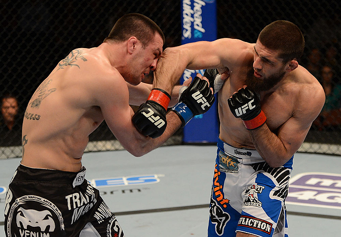 ANAHEIM, CA - FEBRUARY 23: (R-L) Court McGee punches Josh Neer in their welterweight bout during UFC 157 at Honda Center on February 23, 2013 in Anaheim, California. (Photo by Donald Miralle/Zuffa LLC/Zuffa LLC via Getty Images) *** Local Caption *** Co