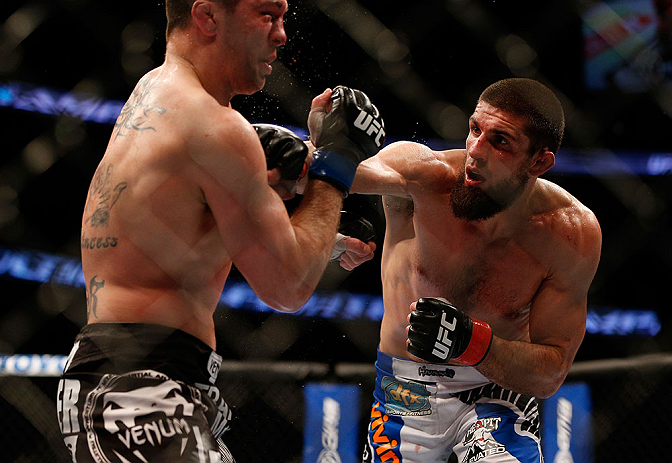 ANAHEIM, CA - FEBRUARY 23: (R-L) Josh Neer punches Court McGee in their welterweight bout during UFC 157 at Honda Center on February 23, 2013 in Anaheim, California. (Photo by Josh Hedges/Zuffa LLC/Zuffa LLC via Getty Images) *** Local Caption *** Court