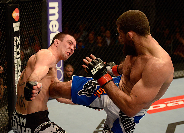 ANAHEIM, CA - FEBRUARY 23: (R-L) Court McGee kicks Josh Neer in their welterweight bout during UFC 157 at Honda Center on February 23, 2013 in Anaheim, California. (Photo by Donald Miralle/Zuffa LLC/Zuffa LLC via Getty Images) *** Local Caption *** Cour