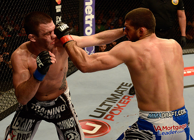ANAHEIM, CA - FEBRUARY 23: (R-L) Court McGee punches Josh Neer in their welterweight bout during UFC 157 at Honda Center on February 23, 2013 in Anaheim, California. (Photo by Donald Miralle/Zuffa LLC/Zuffa LLC via Getty Images) *** Local Caption *** Co