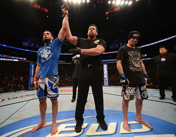ANAHEIM, CA - FEBRUARY 23: Court McGee (left) is declared the winner over Josh Neer in their welterweight bout during UFC 157 at Honda Center on February 23, 2013 in Anaheim, California. (Photo by Donald Miralle/Zuffa LLC/Zuffa LLC via Getty Images) ***
