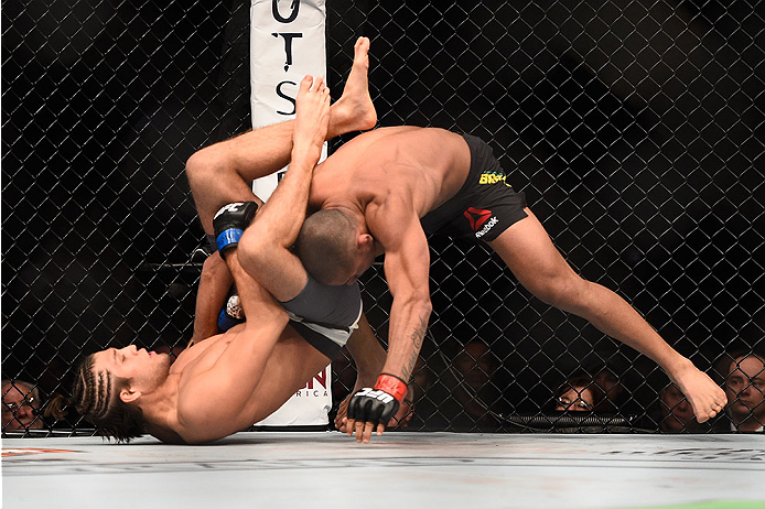 LAS VEGAS, NV - JANUARY 02: Brian Ortega (left) attempts to submit Diego Brandao of Brazil in their featherweight bout during the UFC 195 event inside MGM Grand Garden Arena on January 2, 2016 in Las Vegas, Nevada. (Photo by Jeff Bottari/Zuffa LLC/Zuffa