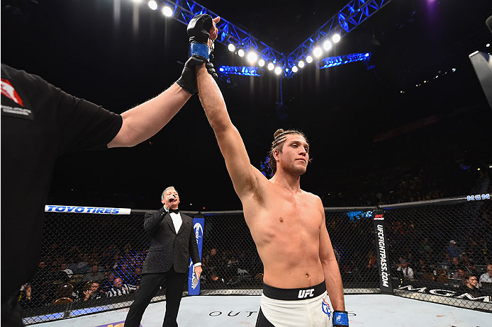 LAS VEGAS, NV - JANUARY 02: Brian Ortega reacts to his submission victory over Diego Brandao of Brazil in their featherweight bout during the UFC 195 event inside MGM Grand Garden Arena on January 2, 2016 in Las Vegas, Nevada. (Photo by Josh Hedges/Zuff