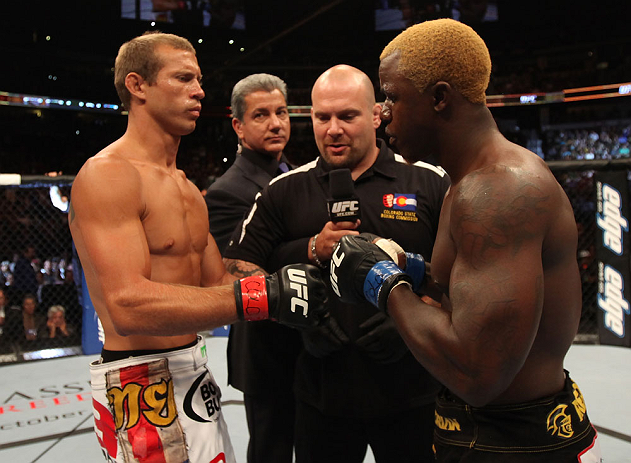 DENVER, CO - AUGUST 11: (L-R) Donald "Cowboy" Cerrone and Melvin Guillard receive final instructions from the referee before their lightweight bout at UFC 150 inside Pepsi Center on August 11, 2012 in Denver, Colorado. (Photo by Nick Laham/Zuffa LLC/Zuff