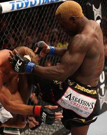 DENVER, CO - AUGUST 11: (R-L) Melvin Guillard delivers a knee strike against Donald "Cowboy" Cerrone during their lightweight bout at UFC 150 inside Pepsi Center on August 11, 2012 in Denver, Colorado. (Photo by Nick Laham/Zuffa LLC/Zuffa LLC via Getty I