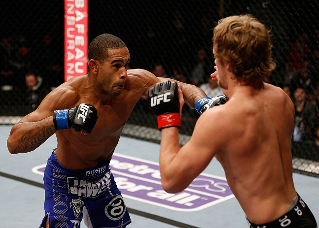 LONDON, ENGLAND - FEBRUARY 16: (L-R) Jorge Santiago punches Gunnar Nelson in their welterweight fight during the UFC on Fuel TV event on February 16, 2013 at Wembley Arena in London, England. (Photo by Josh Hedges/Zuffa LLC/Zuffa LLC via Getty Images)