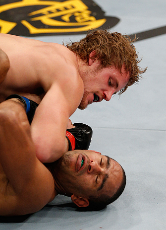 LONDON, ENGLAND - FEBRUARY 16: (L-R) Gunnar Nelson elbows Jorge Santiago in their welterweight fight during the UFC on Fuel TV event on February 16, 2013 at Wembley Arena in London, England. (Photo by Josh Hedges/Zuffa LLC/Zuffa LLC via Getty Images)