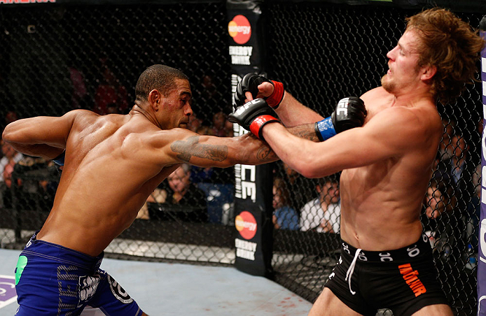 LONDON, ENGLAND - FEBRUARY 16: (L-R) Jorge Santiago punches Gunnar Nelson in their welterweight fight during the UFC on Fuel TV event on February 16, 2013 at Wembley Arena in London, England. (Photo by Josh Hedges/Zuffa LLC/Zuffa LLC via Getty Images)