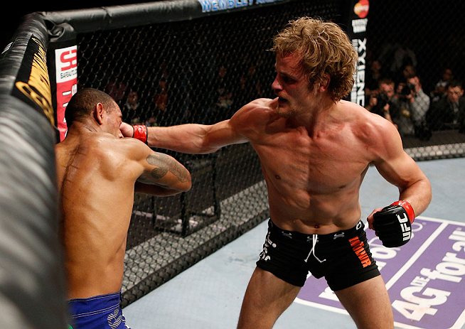 LONDON, ENGLAND - FEBRUARY 16: (R-L) Gunnar Nelson punches Jorge Santiago in their welterweight fight during the UFC on Fuel TV event on February 16, 2013 at Wembley Arena in London, England. (Photo by Josh Hedges/Zuffa LLC/Zuffa LLC via Getty Images)