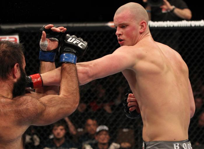 OMAHA, NE - FEBRUARY 15: (R-L) Stefan Struve punches Dave Herman during the UFC on FUEL TV event at Omaha Civic Auditorium on February 15, 2012 in Omaha, Nebraska. (Photo by Josh Hedges/Zuffa LLC/Zuffa LLC via Getty Images) *** Local Caption *** Stefan