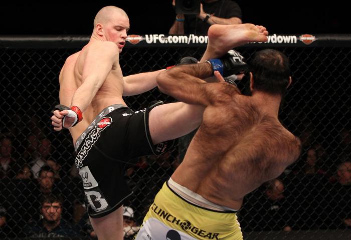 OMAHA, NE - FEBRUARY 15: (L-R) Stefan Struve kicks Dave Herman during the UFC on FUEL TV event at Omaha Civic Auditorium on February 15, 2012 in Omaha, Nebraska. (Photo by Josh Hedges/Zuffa LLC/Zuffa LLC via Getty Images) *** Local Caption *** Stefan St