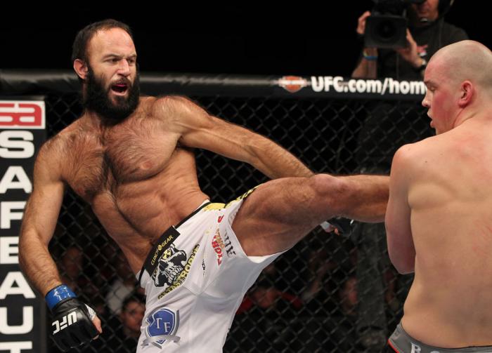 OMAHA, NE - FEBRUARY 15: (L-R) Dave Herman kicks Stefan Struve during the UFC on FUEL TV event at Omaha Civic Auditorium on February 15, 2012 in Omaha, Nebraska. (Photo by Josh Hedges/Zuffa LLC/Zuffa LLC via Getty Images) *** Local Caption *** Stefan St