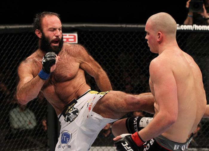 OMAHA, NE - FEBRUARY 15: (L-R) Dave Herman kicks Stefan Struve during the UFC on FUEL TV event at Omaha Civic Auditorium on February 15, 2012 in Omaha, Nebraska. (Photo by Josh Hedges/Zuffa LLC/Zuffa LLC via Getty Images) *** Local Caption *** Stefan St