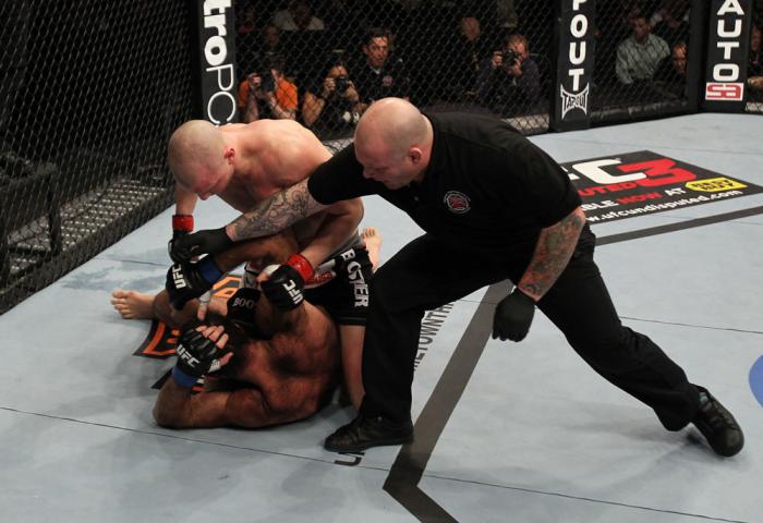 OMAHA, NE - FEBRUARY 15: (R-L) Referee Josh Rosenthal steps in to stop the bout between Stefan Struve and Dave Herman during the UFC on FUEL TV event at Omaha Civic Auditorium on February 15, 2012 in Omaha, Nebraska. (Photo by Josh Hedges/Zuffa LLC/Zuff