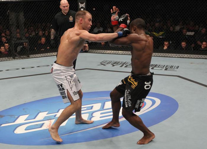 TORONTO, ON - DECEMBER 10: Brian Ebersole (white shorts) punches Claude Patrick during the UFC 140 event at Air Canada Centre on December 10, 2011 in Toronto, Ontario, Canada. (Photo by Nick Laham/Zuffa LLC/Zuffa LLC via Getty Images)