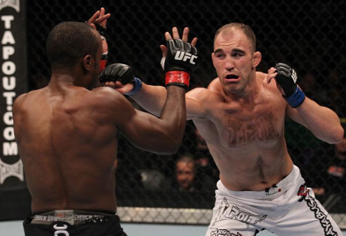 TORONTO, ON - DECEMBER 10: Brian Ebersole (white shorts) punches Claude Patrick during the UFC 140 event at Air Canada Centre on December 10, 2011 in Toronto, Ontario, Canada. (Photo by Nick Laham/Zuffa LLC/Zuffa LLC via Getty Images)