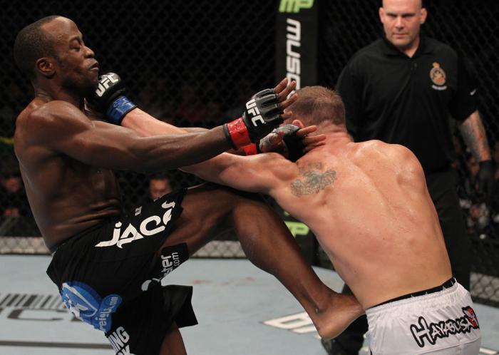 TORONTO, ON - DECEMBER 10: Brian Ebersole (white shorts) punches Claude Patrick during the UFC 140 event at Air Canada Centre on December 10, 2011 in Toronto, Ontario, Canada. (Photo by Nick Laham/Zuffa LLC/Zuffa LLC via Getty Images)