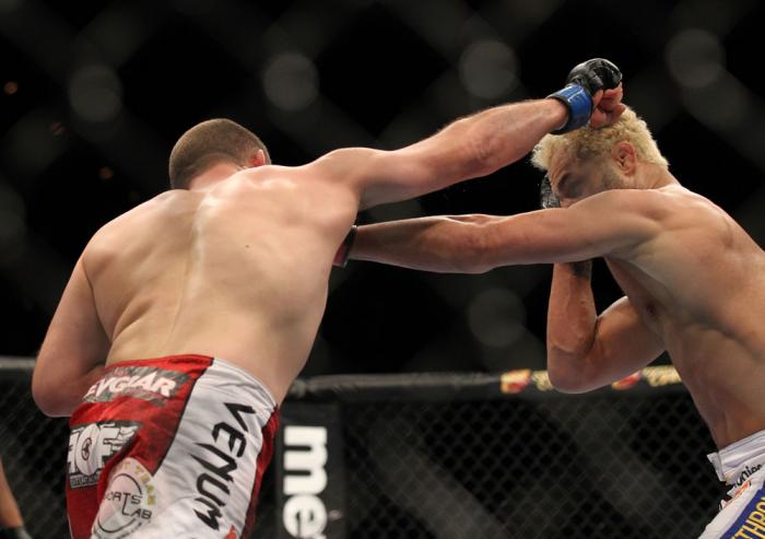 LAS VEGAS, NV - FEBRUARY 04: (L-R) Mike Pierce and Josh Koscheck exchange punches during the UFC 143 event at Mandalay Bay Events Center on February 4, 2012 in Las Vegas, Nevada. (Photo by Josh Hedges/Zuffa LLC/Zuffa LLC via Getty Images) *** Local Capt