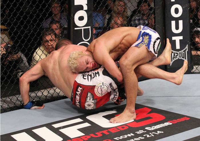 LAS VEGAS, NV - FEBRUARY 04: Josh Koscheck (right) wrestles Mike Pierce to the ground during the UFC 143 event at Mandalay Bay Events Center on February 4, 2012 in Las Vegas, Nevada. (Photo by Nick Laham/Zuffa LLC/Zuffa LLC via Getty Images) *** Local C