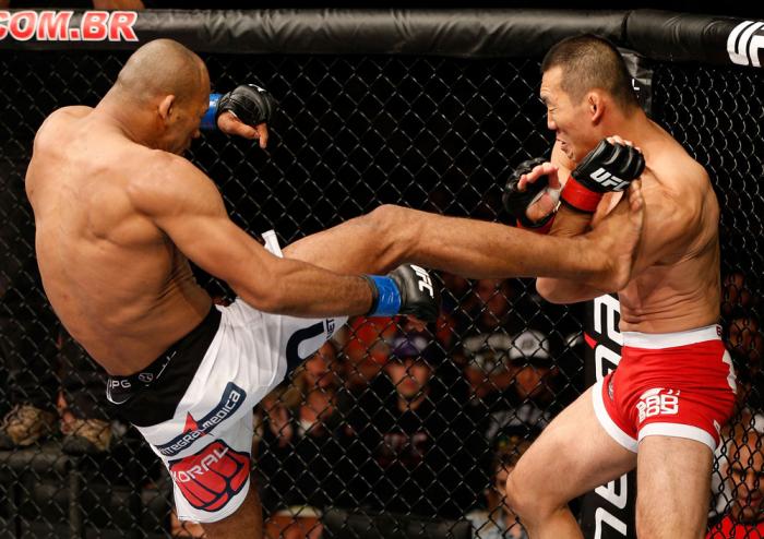 BELO HORIZONTE, BRAZIL - SEPTEMBER 04: (L-R) Ronaldo "Jacare" Souza kicks Yushin Okami in their middleweight fight during the UFC on FOX Sports 1 event at Mineirinho Arena on September 4, 2013 in Belo Horizonte, Brazil. (Photo by Josh Hedges/Zuffa LLC/Zu