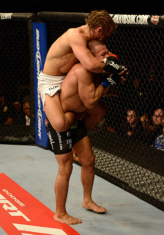 ANAHEIM, CA - FEBRUARY 23: Urijah Faber (left) attempts to submit Ivan Menjivar in their bantamweight bout during UFC 157 at Honda Center on February 23, 2013 in Anaheim, California. (Photo by Donald Miralle/Zuffa LLC/Zuffa LLC via Getty Images) *** Loc