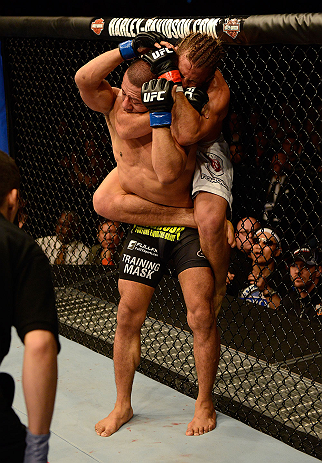 ANAHEIM, CA - FEBRUARY 23: Urijah Faber (white shorts) attempts to submit Ivan Menjivar in their bantamweight bout during UFC 157 at Honda Center on February 23, 2013 in Anaheim, California. (Photo by Donald Miralle/Zuffa LLC/Zuffa LLC via Getty Images)