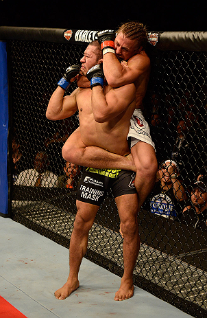 ANAHEIM, CA - FEBRUARY 23: Urijah Faber (white shorts) attempts to submit Ivan Menjivar in their bantamweight bout during UFC 157 at Honda Center on February 23, 2013 in Anaheim, California. (Photo by Donald Miralle/Zuffa LLC/Zuffa LLC via Getty Images)
