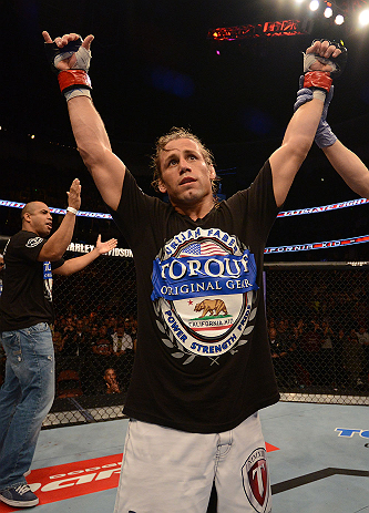 ANAHEIM, CA - FEBRUARY 23: Urijah Faber is declared the winner over Ivan Menjivar in their bantamweight bout during UFC 157 at Honda Center on February 23, 2013 in Anaheim, California. (Photo by Donald Miralle/Zuffa LLC/Zuffa LLC via Getty Images) *** L
