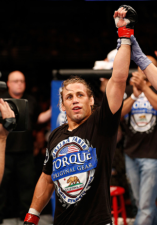 ANAHEIM, CA - FEBRUARY 23: Urijah Faber is declared the winner over Ivan Menjivar in their bantamweight bout during UFC 157 at Honda Center on February 23, 2013 in Anaheim, California. (Photo by Josh Hedges/Zuffa LLC/Zuffa LLC via Getty Images) *** Loca