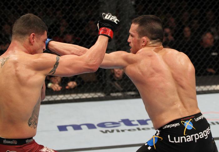 OMAHA, NE - FEBRUARY 15: (R-L) Jake Ellenberger punches Diego Sanchez during the UFC on FUEL TV event at Omaha Civic Auditorium on February 15, 2012 in Omaha, Nebraska. (Photo by Josh Hedges/Zuffa LLC/Zuffa LLC via Getty Images) *** Local Caption *** Ja