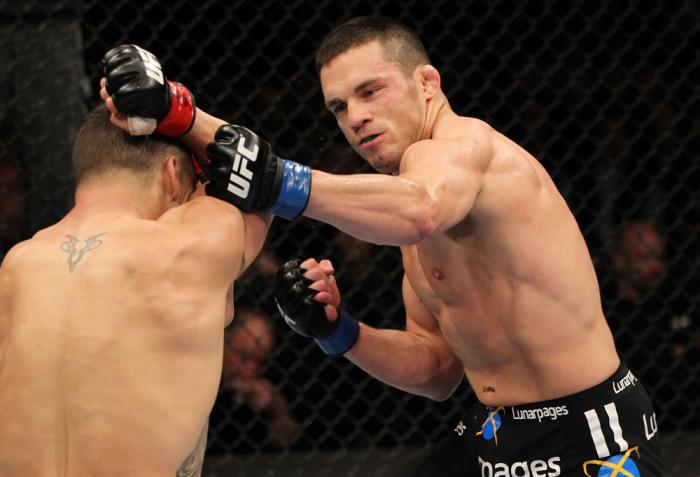 OMAHA, NE - FEBRUARY 15: (R-L) Jake Ellenberger punches Diego Sanchez during the UFC on FUEL TV event at Omaha Civic Auditorium on February 15, 2012 in Omaha, Nebraska. (Photo by Josh Hedges/Zuffa LLC/Zuffa LLC via Getty Images) *** Local Caption *** Ja