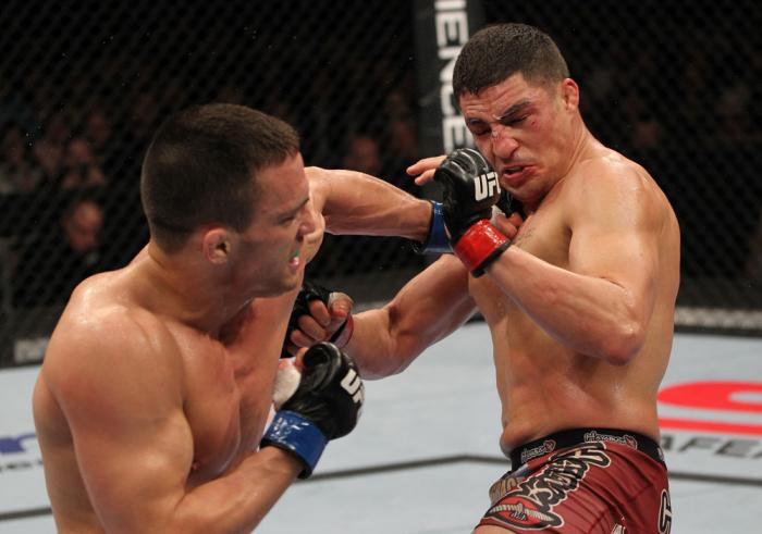 OMAHA, NE - FEBRUARY 15: (L-R) Jake Ellenberger punches Diego Sanchez during the UFC on FUEL TV event at Omaha Civic Auditorium on February 15, 2012 in Omaha, Nebraska. (Photo by Josh Hedges/Zuffa LLC/Zuffa LLC via Getty Images) *** Local Caption *** Ja