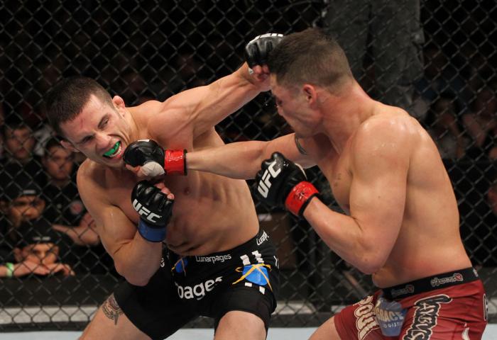 OMAHA, NE - FEBRUARY 15: (L-R) Jake Ellenberger and Diego Sanchez trade punches during the UFC on FUEL TV event at Omaha Civic Auditorium on February 15, 2012 in Omaha, Nebraska. (Photo by Josh Hedges/Zuffa LLC/Zuffa LLC via Getty Images) *** Local Capt