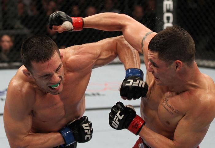 OMAHA, NE - FEBRUARY 15: (L-R) Jake Ellenberger and Diego Sanchez trade punches during the UFC on FUEL TV event at Omaha Civic Auditorium on February 15, 2012 in Omaha, Nebraska. (Photo by Josh Hedges/Zuffa LLC/Zuffa LLC via Getty Images) *** Local Capt