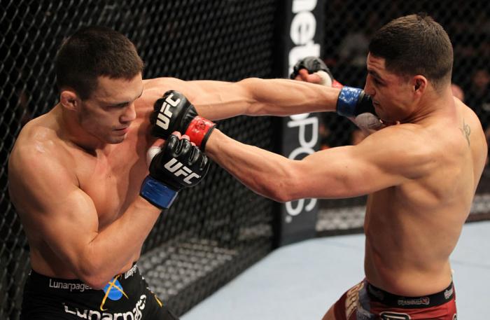 OMAHA, NE - FEBRUARY 15: (L-R) Jake Ellenberger and Diego Sanchez trade punches during the UFC on FUEL TV event at Omaha Civic Auditorium on February 15, 2012 in Omaha, Nebraska. (Photo by Josh Hedges/Zuffa LLC/Zuffa LLC via Getty Images) *** Local Capt