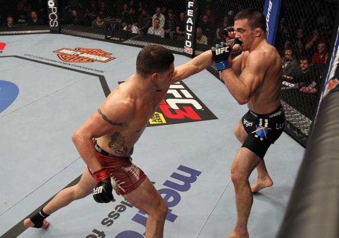 OMAHA, NE - FEBRUARY 15: (L-R) Diego Sanchez punches Jake Ellenberger during the UFC on FUEL TV event at Omaha Civic Auditorium on February 15, 2012 in Omaha, Nebraska. (Photo by Josh Hedges/Zuffa LLC/Zuffa LLC via Getty Images) *** Local Caption *** Ja