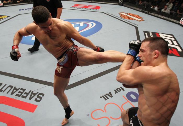 OMAHA, NE - FEBRUARY 15: (L-R) Diego Sanchez kicks Jake Ellenberger during the UFC on FUEL TV event at Omaha Civic Auditorium on February 15, 2012 in Omaha, Nebraska. (Photo by Josh Hedges/Zuffa LLC/Zuffa LLC via Getty Images) *** Local Caption *** Jake