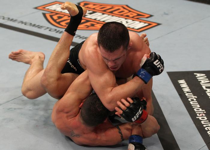 OMAHA, NE - FEBRUARY 15: Jake Ellenberger delivers an elbow strike against Diego Sanchez during the UFC on FUEL TV event at Omaha Civic Auditorium on February 15, 2012 in Omaha, Nebraska. (Photo by Josh Hedges/Zuffa LLC/Zuffa LLC via Getty Images) *** L