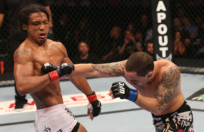 DENVER, CO - AUGUST 11: (R-L) Frankie Edgar punches Benson Henderson during their lightweight championship bout at UFC 150 inside Pepsi Center on August 11, 2012 in Denver, Colorado. (Photo by Nick Laham/Zuffa LLC/Zuffa LLC via Getty Images)