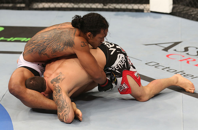 DENVER, CO - AUGUST 11: (R-L) Frankie Edgar attempts to take down Frankie Edgar during their lightweight championship bout at UFC 150 inside Pepsi Center on August 11, 2012 in Denver, Colorado. (Photo by Nick Laham/Zuffa LLC/Zuffa LLC via Getty Images)