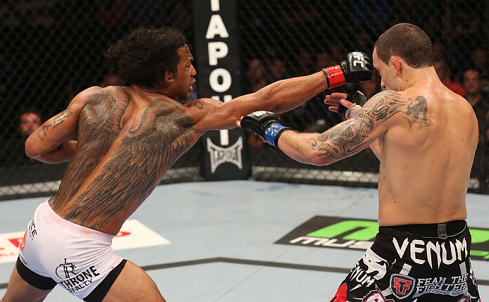 DENVER, CO - AUGUST 11: (L-R) Benson Henderson punches Frankie Edgar during their lightweight championship bout at UFC 150 inside Pepsi Center on August 11, 2012 in Denver, Colorado. (Photo by Nick Laham/Zuffa LLC/Zuffa LLC via Getty Images)