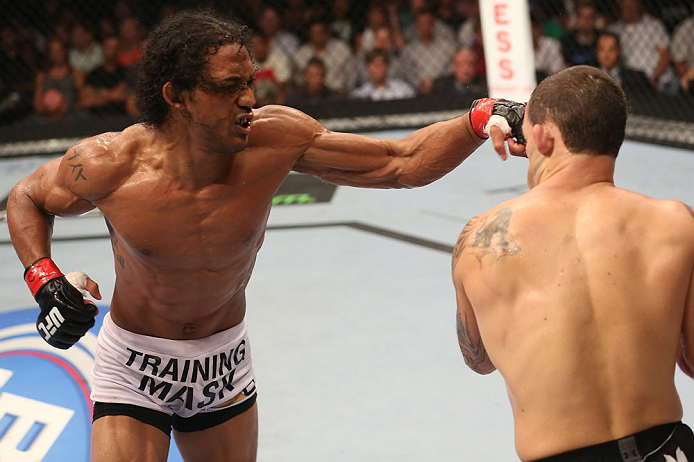 DENVER, CO - AUGUST 11: (L-R) Benson Henderson punches Frankie Edgar during their lightweight championship bout at UFC 150 inside Pepsi Center on August 11, 2012 in Denver, Colorado. (Photo by Nick Laham/Zuffa LLC/Zuffa LLC via Getty Images)