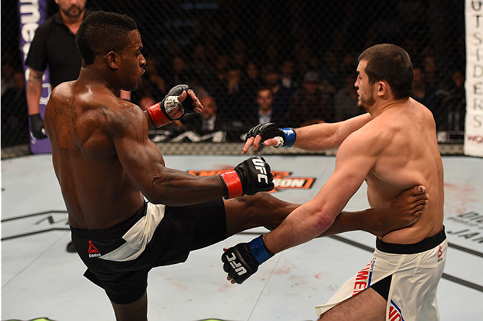 LAS VEGAS, NV - JANUARY 02: (L-R) Lorenz Larkin kicks Albert Tumenov of Russia in their welterweight bout during the UFC 195 event inside MGM Grand Garden Arena on January 2, 2016 in Las Vegas, Nevada. (Photo by Josh Hedges/Zuffa LLC/Zuffa LLC via Getty