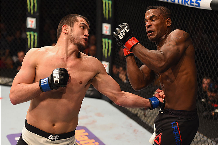 LAS VEGAS, NV - JANUARY 02: (L-R) Albert Tumenov of Russia punches Lorenz Larkin in their welterweight bout during the UFC 195 event inside MGM Grand Garden Arena on January 2, 2016 in Las Vegas, Nevada. (Photo by Josh Hedges/Zuffa LLC/Zuffa LLC via Gett