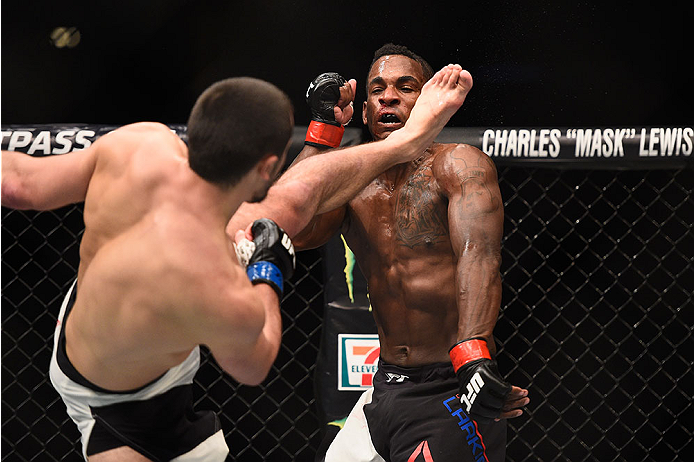 LAS VEGAS, NV - JANUARY 02: (L-R) Albert Tumenov of Russia kicks Lorenz Larkin in their welterweight bout during the UFC 195 event inside MGM Grand Garden Arena on January 2, 2016 in Las Vegas, Nevada. (Photo by Jeff Bottari/Zuffa LLC/Zuffa LLC via Getty