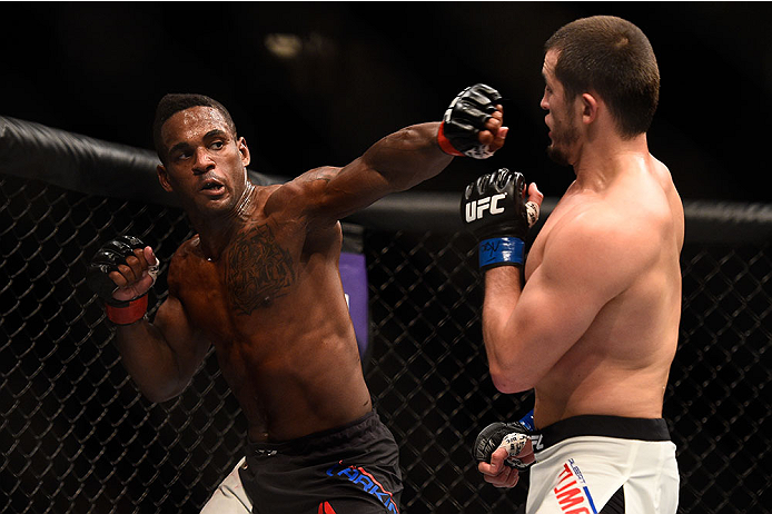 LAS VEGAS, NV - JANUARY 02: (L-R) Lorenz Larkin punches Albert Tumenov of Russia in their welterweight bout during the UFC 195 event inside MGM Grand Garden Arena on January 2, 2016 in Las Vegas, Nevada. (Photo by Jeff Bottari/Zuffa LLC/Zuffa LLC via Get