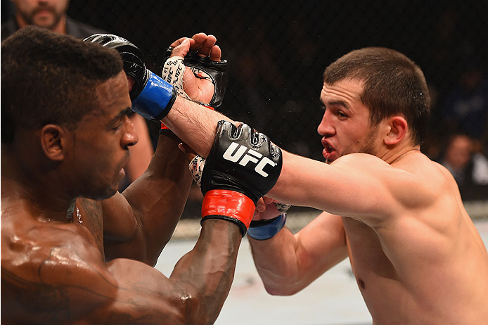 LAS VEGAS, NV - JANUARY 02: (R-L) Albert Tumenov of Russia punches Lorenz Larkin in their welterweight bout during the UFC 195 event inside MGM Grand Garden Arena on January 2, 2016 in Las Vegas, Nevada. (Photo by Josh Hedges/Zuffa LLC/Zuffa LLC via Gett