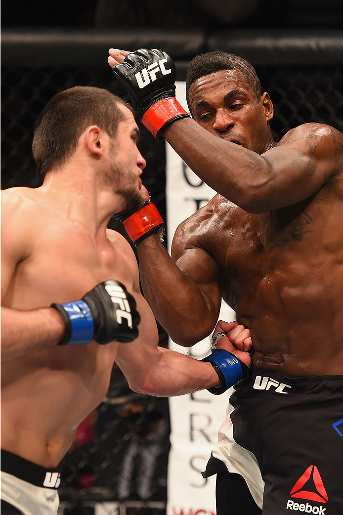 LAS VEGAS, NV - JANUARY 02: (L-R) Albert Tumenov of Russia punches Lorenz Larkin in their welterweight bout during the UFC 195 event inside MGM Grand Garden Arena on January 2, 2016 in Las Vegas, Nevada. (Photo by Josh Hedges/Zuffa LLC/Zuffa LLC via Gett